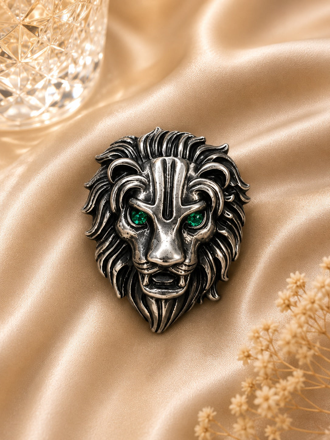 Silver Lion Brooch with Emerald Green Crystal Eyes