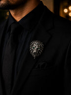 Silver Lion Brooch with Emerald Green Crystal Eyes
